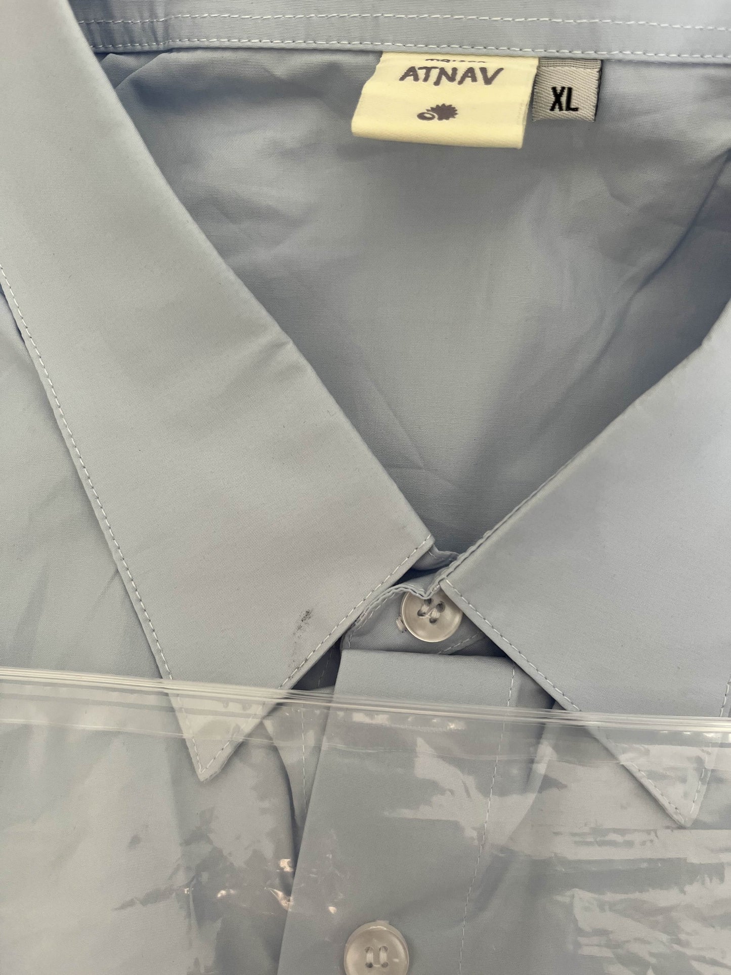 La chemise pêche jaune (défaut)