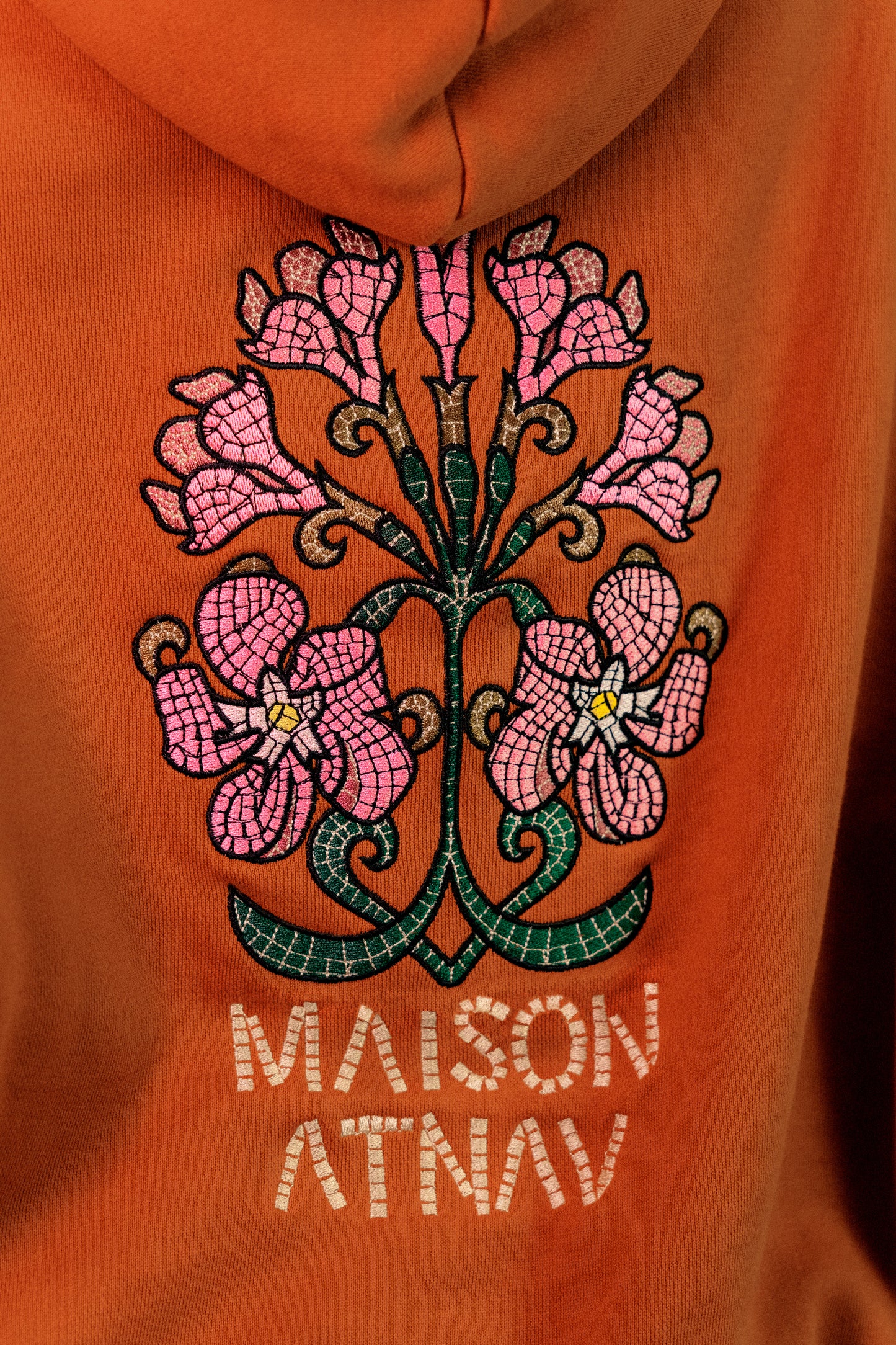 Le sweat à capuche boxy mosaïque