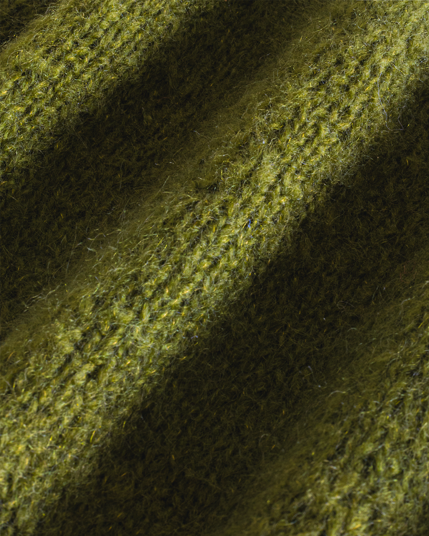 Le gilet sans manches en mohair