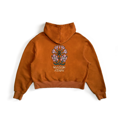 Le sweat à capuche boxy mosaïque