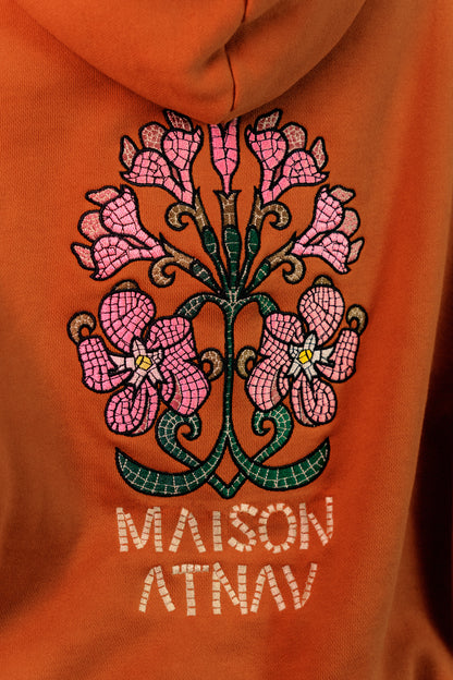 Le sweat à capuche boxy mosaïque